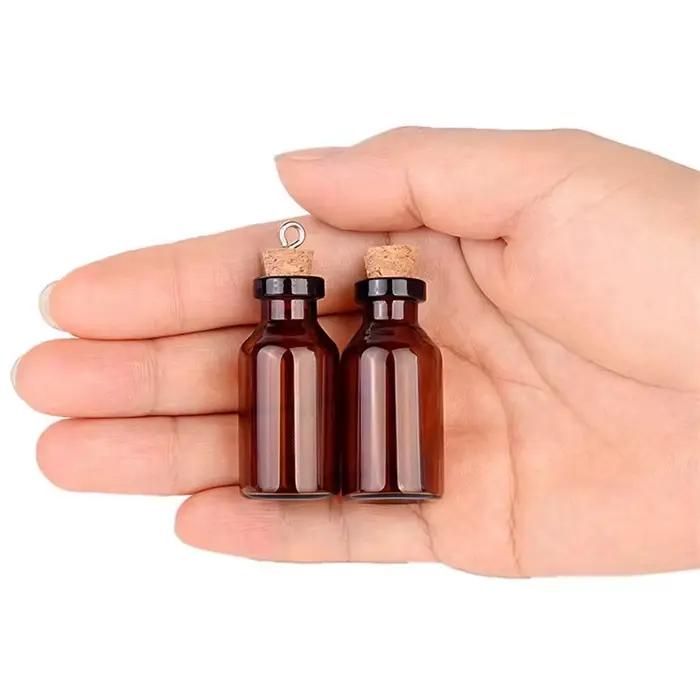 Petites bouteilles en verre ambré avec bouchons en liège