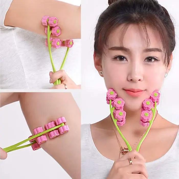 Rouleau de massage facial portable en forme de fleur
