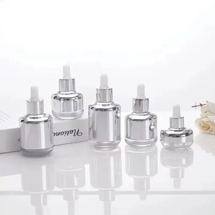 Flacon compte-gouttes 20ML-60ML or argent liquide d'aromathérapie pour récipient cosmétique essentiel huile de Massage Pipette bouteille rechargeable