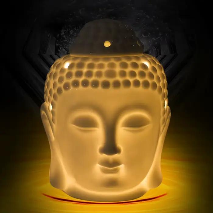 Brûleur d'huile aromatique en céramique en forme de tête de Bouddha