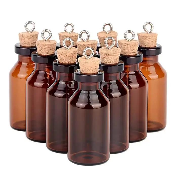 Petites bouteilles en verre ambré avec bouchons en liège