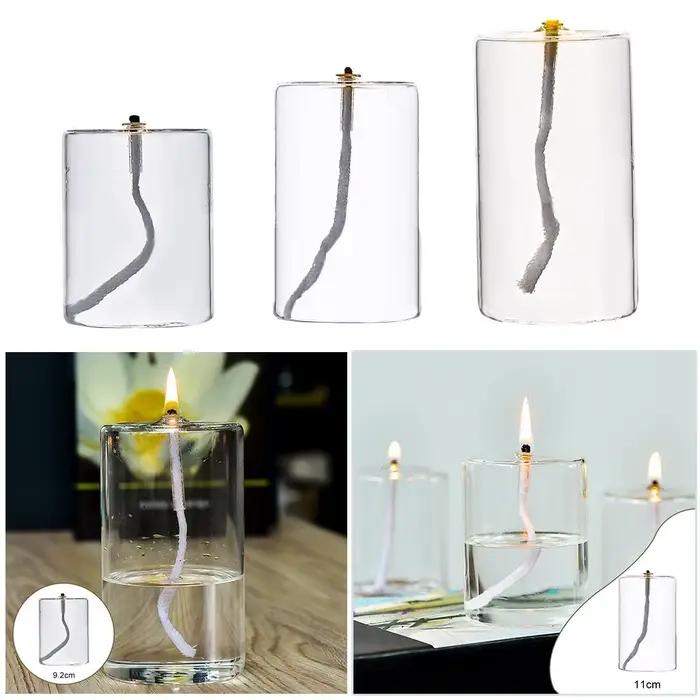 Bougie à huile en verre rechargeable dans un bougeoir