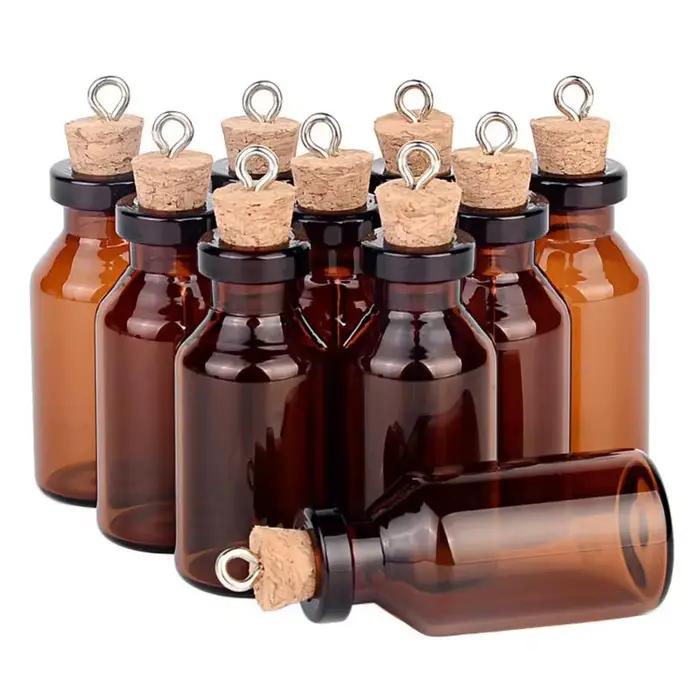 Petites bouteilles en verre ambré avec bouchons en liège