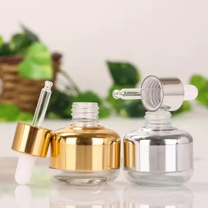 Flacon compte-gouttes 20ML-60ML or argent liquide d'aromathérapie pour récipient cosmétique essentiel huile de Massage Pipette bouteille rechargeable