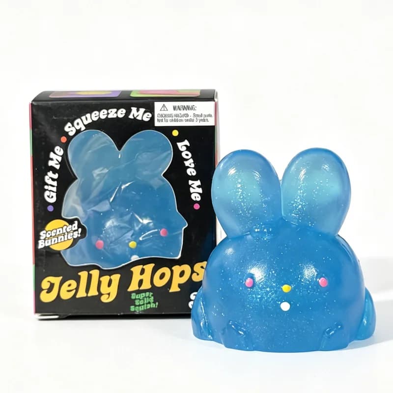 Jelly Hops Needoh Lapin Mignon Parfumé en TPR, Balle Anti-stress Souple et Extensible à Paillettes, 