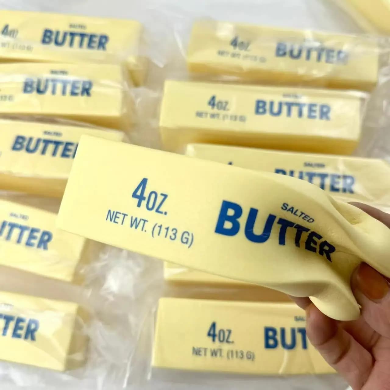 Jouet anti-stress à presser doux en forme de barre de beurre à retour lent