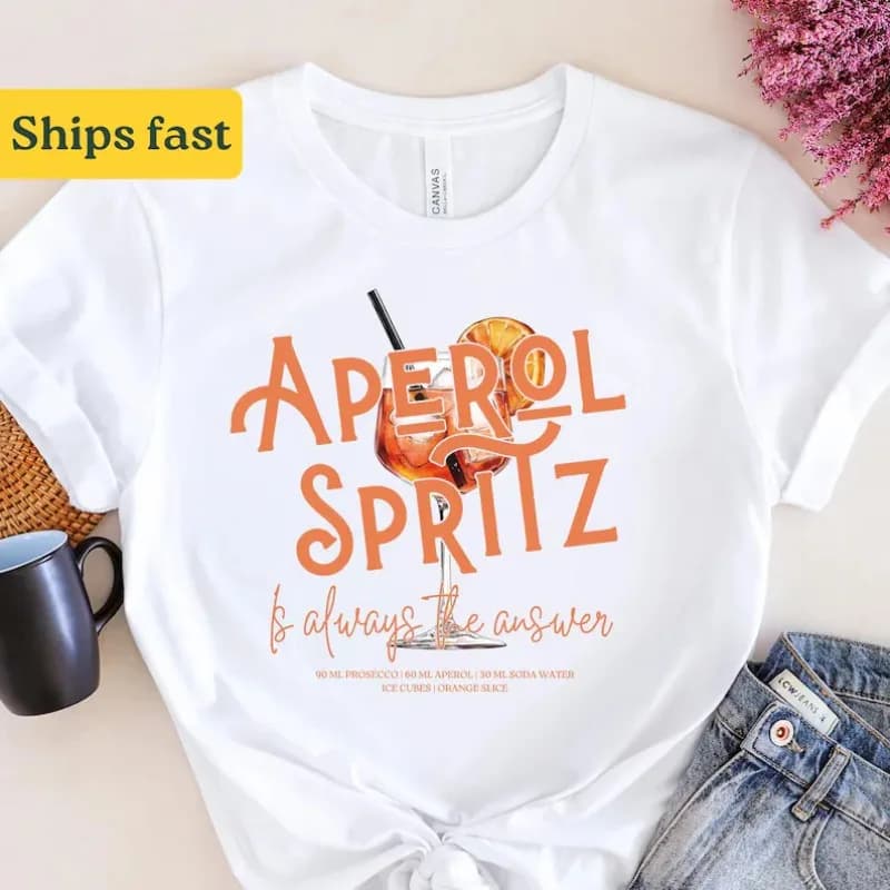 T-shirt de recette Aperol Spritz. Tee noir avec texte Aperol Prosecco 60 ml et graphique de tranche 