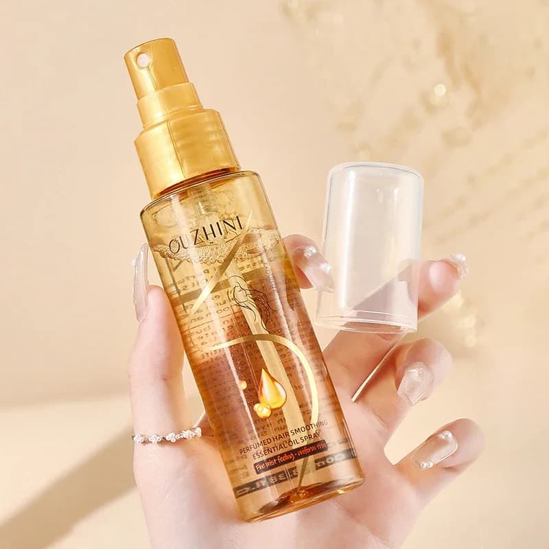 Le spray d'huile essentielle de soin capillaire nourrissant en profondeur peut augmenter la brillanc