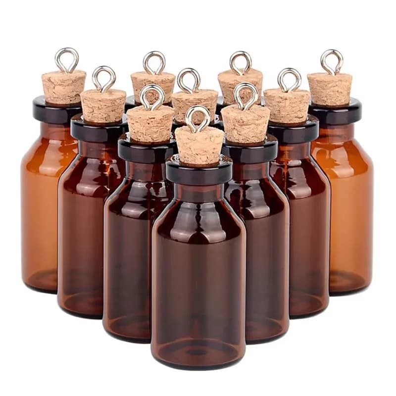 Petites bouteilles en verre ambré avec bouchons en liège
