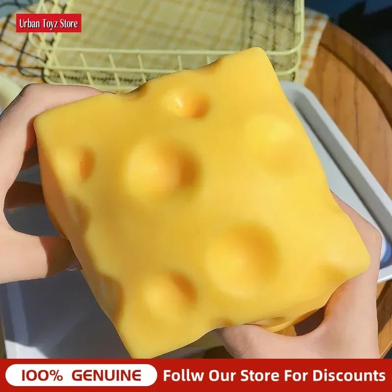 Jouet géant à presser en forme de fromage