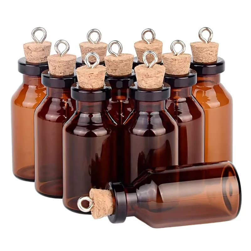 Petites bouteilles en verre ambré avec bouchons en liège