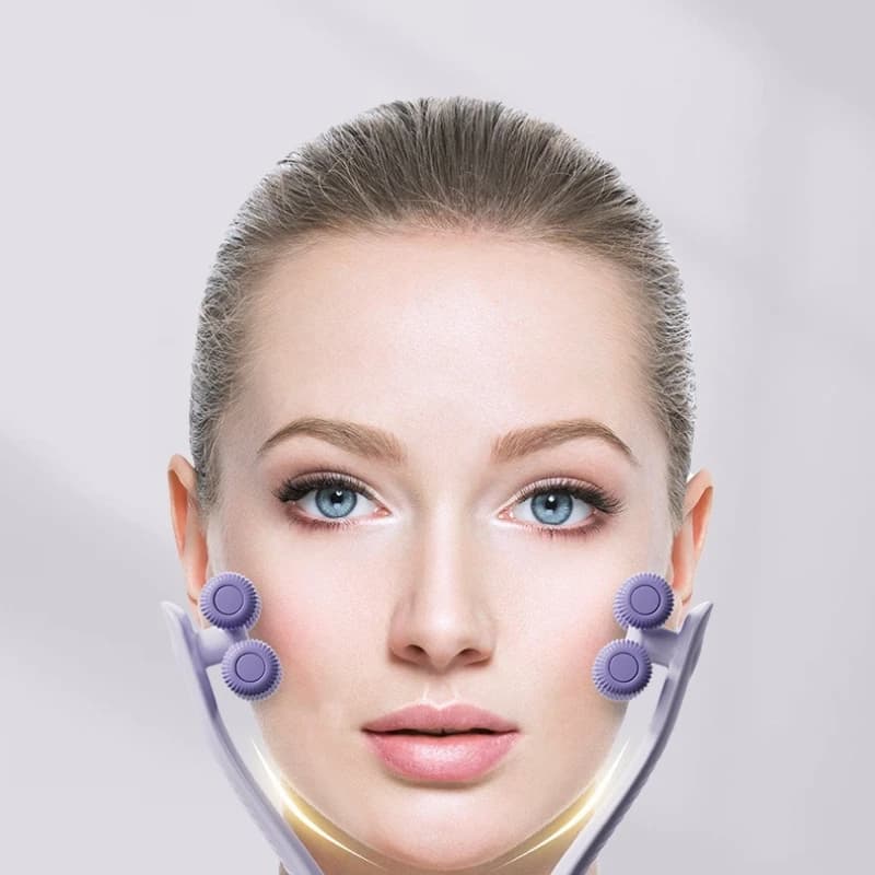Masseur facial à rouleaux portable multifonctionnel favorisant l'absorption des produits