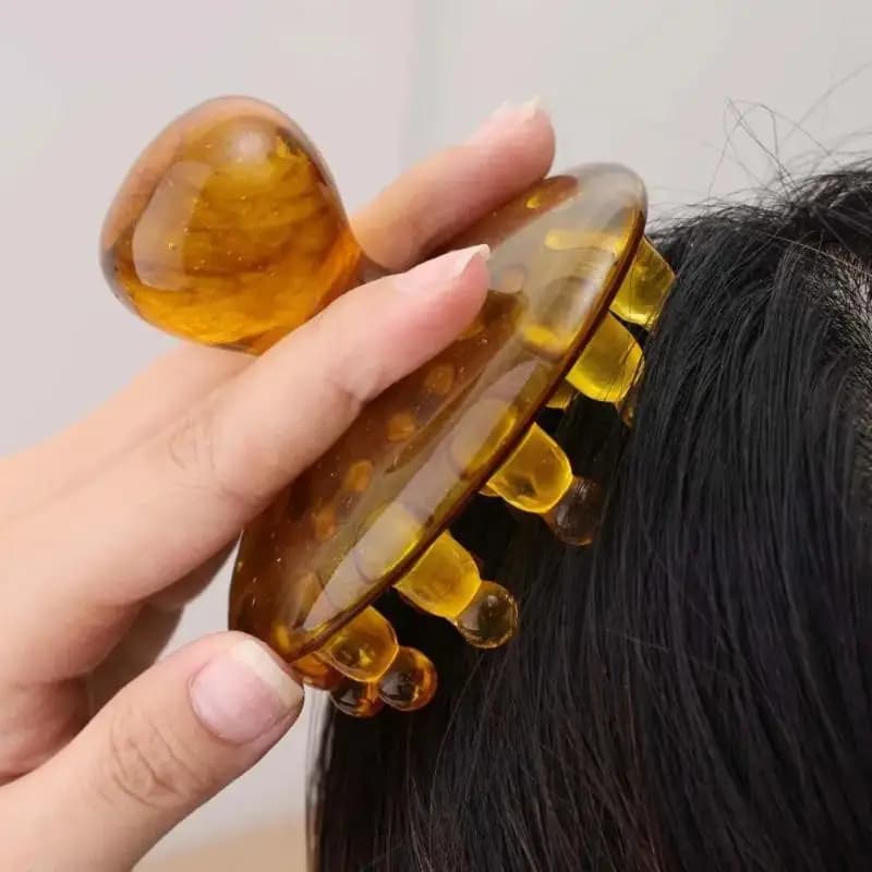 Brosses de massage rose et marron pour le corps