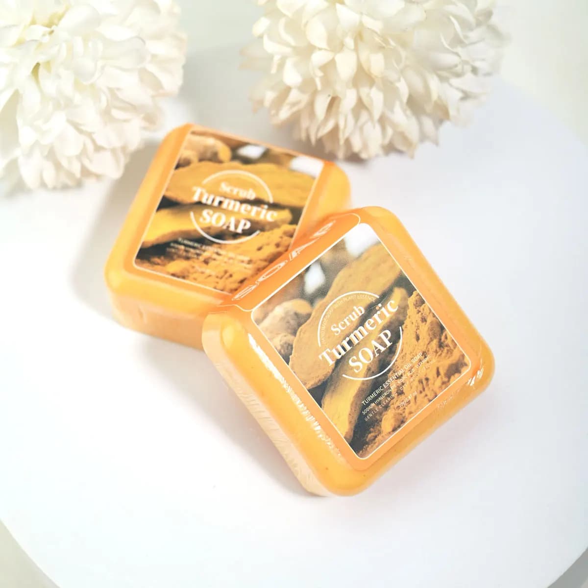 Le savon nettoyant aux huiles essentielles de curcuma contenant l'acide citrique Vc peut nettoyer en profondeur et éclaircir la peau, c'est un savon jetable