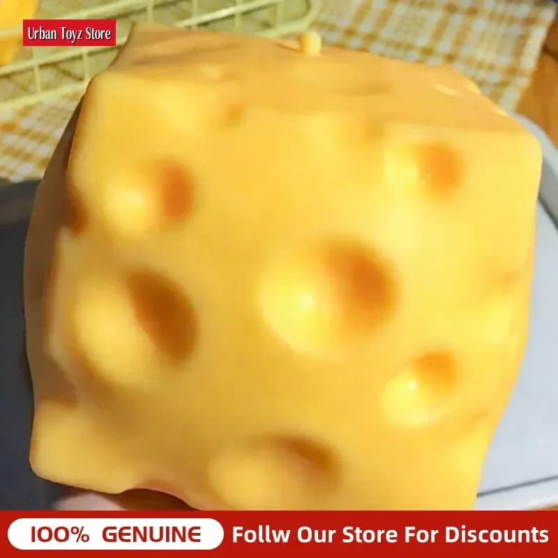 Jouet géant à presser en forme de fromage