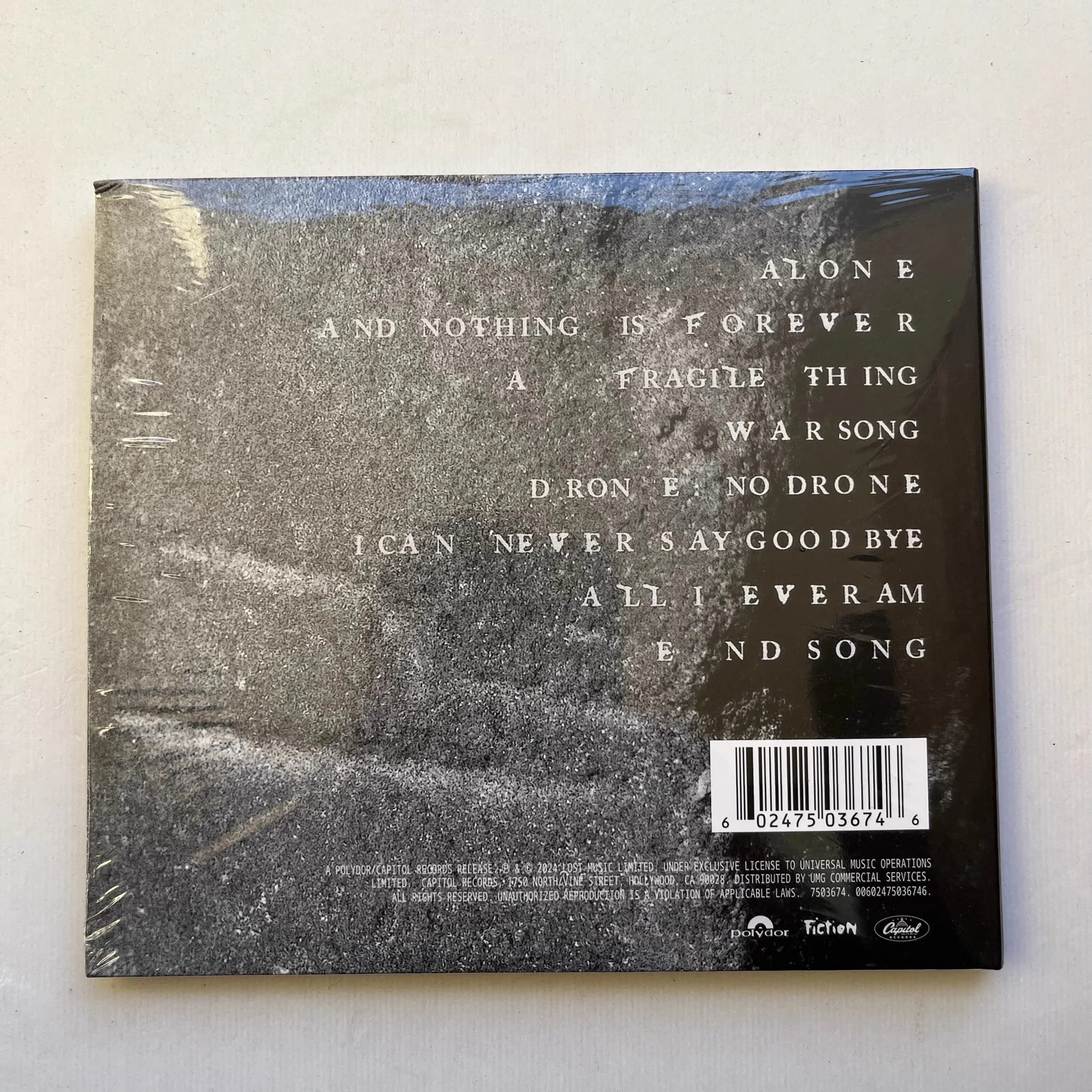 Rock The Cure Robert Smith musique CD chansons d'un monde perdu Album enregistrement