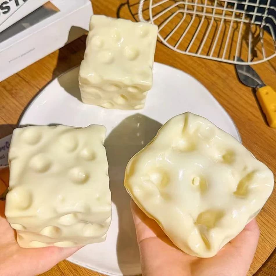 Balle anti-stress en forme de cube de fromage