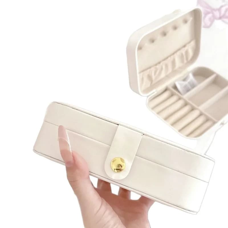 Boîte à bijoux haut de gamme au design élégant, boucles d'oreilles exquises, colliers et bagues délicats, boîte de rangement pour accessoires de grande capacité, sac de voyage portable.