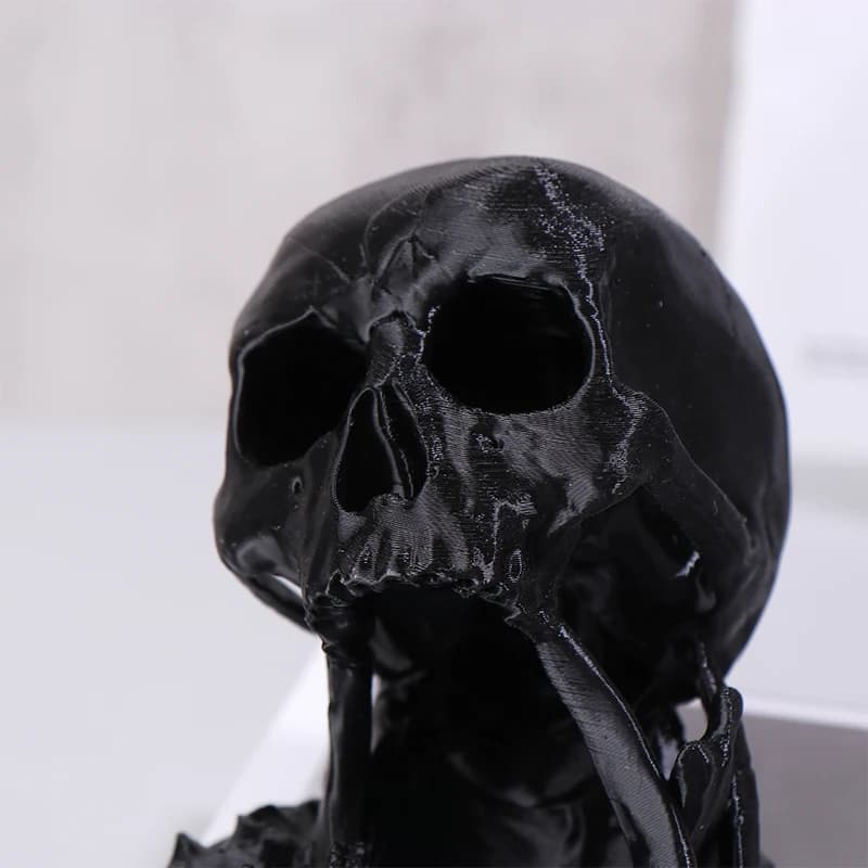 Tour de dés à tête de mort imprimée en 3D