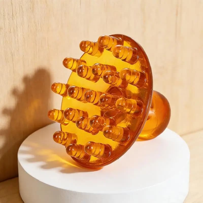 Brosses de massage rose et marron pour le corps