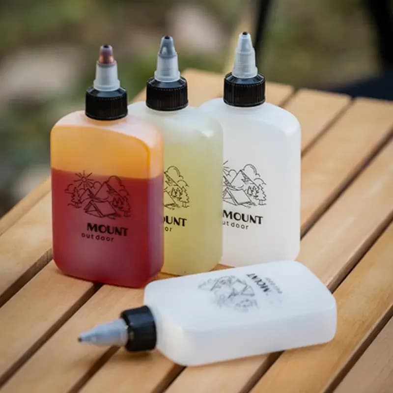 Bouteille distributrice d'huile de Camping en plein air