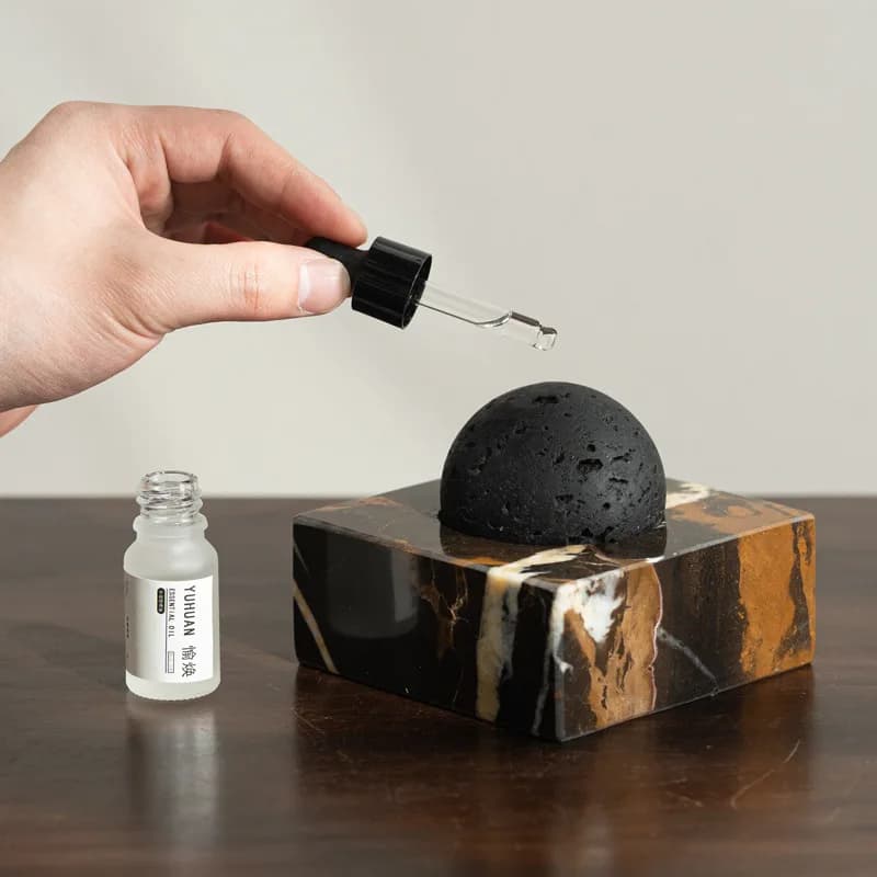 Diffuseur de pierre de roche de lave noire avec base en marbre