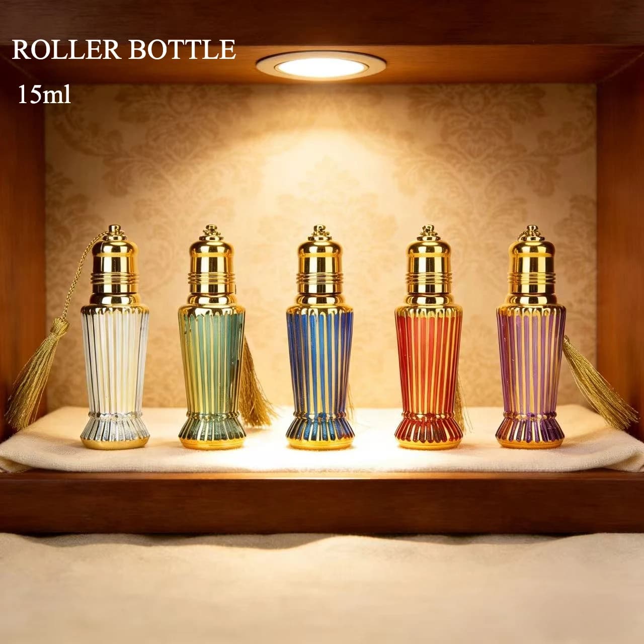 1 flacon roll-on en verre plaqué or de 15 ml avec bouchon à pompon, flacon de parfum portable de luxe pour sac à main et voyage, couleur aléatoire