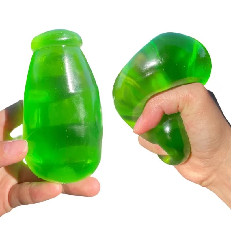 Jouet anti-stress en forme de bouteille d'huile de coco verte