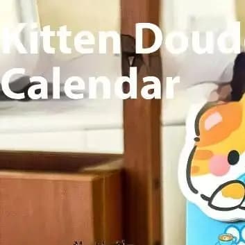 Mini calendrier de bureau avec chat de dessin animé