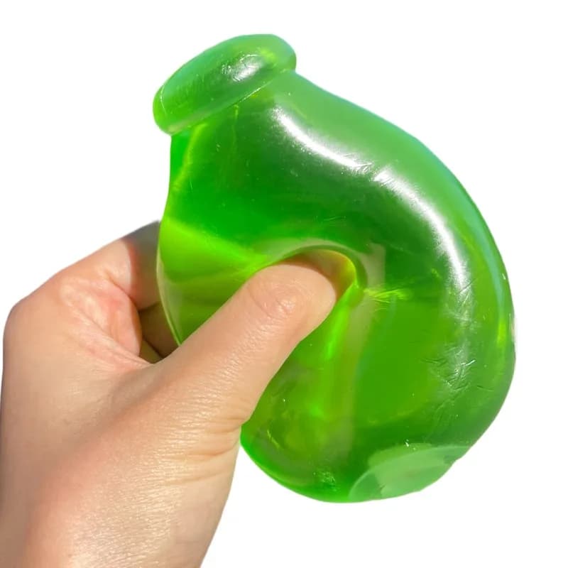 Jouet anti-stress en forme de bouteille d'huile de coco verte