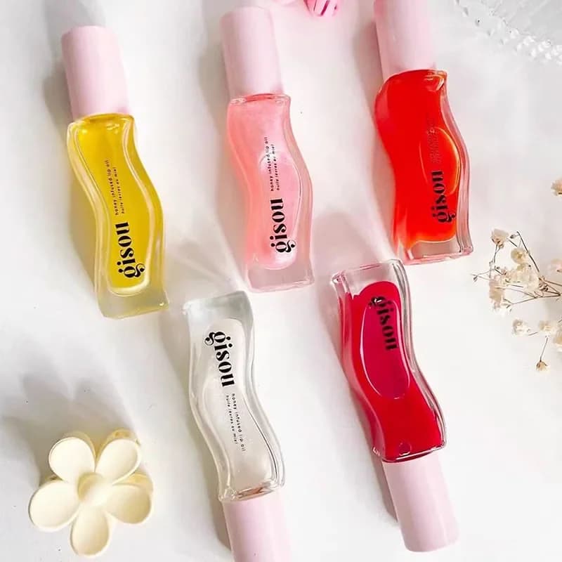 Nouveau Gisou miel huile capillaire 20ml Essence huile pour les lèvres rouge à lèvres hydratant réduire les lignes des lèvres liquide exfoliant brillant maquillage lèvres soin