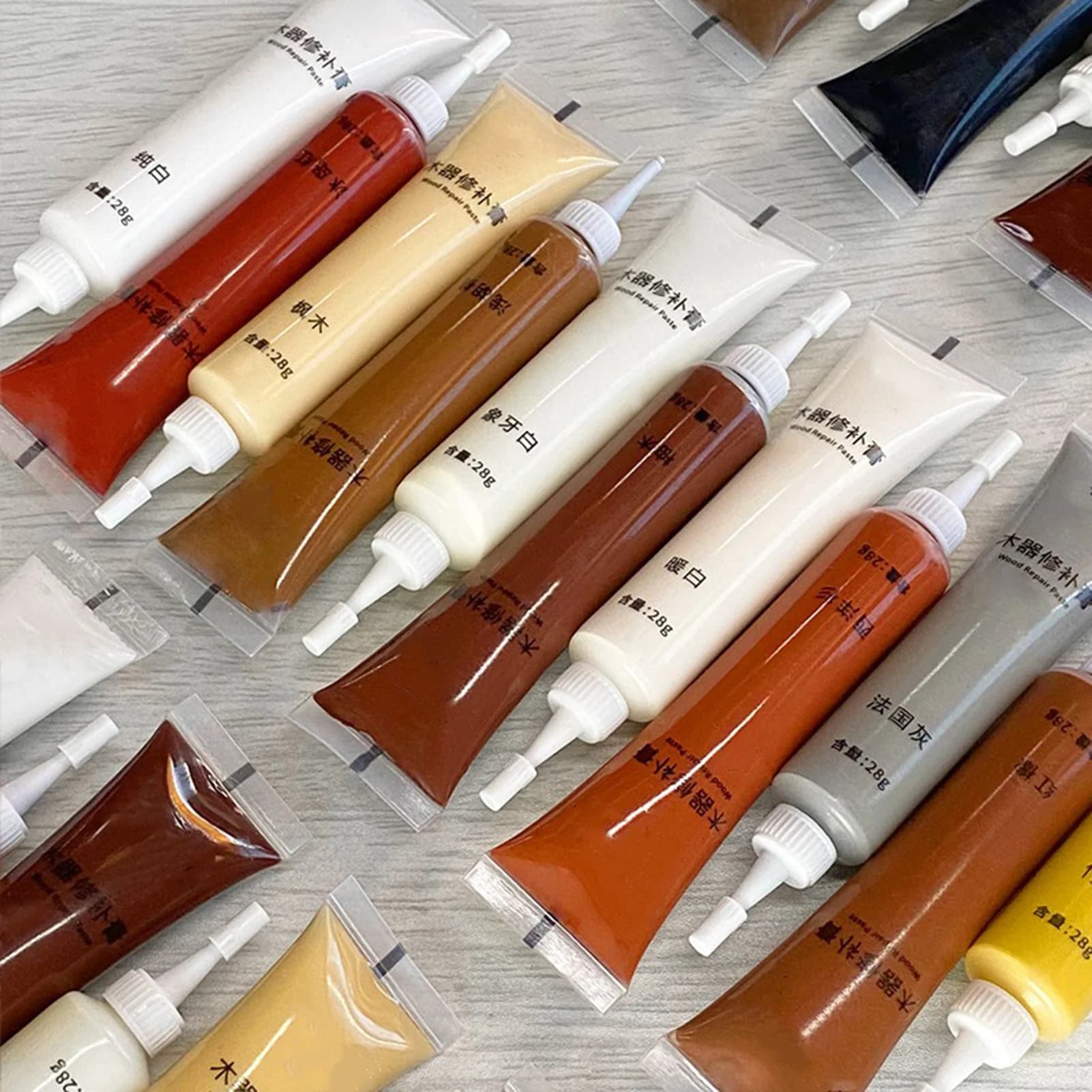 Réparation de peinture à gratter pour plancher de remplissage de bois